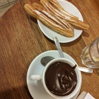 Churros and dark chocolate sauce at Petritxol Xocoa in Barcelona