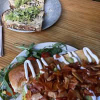 Back : Hummus and Avocado | Front : Brioche with scrambled eggs, avocado, sour cream and bacon bites! totally vegan…  at Frutas Prohibidas in Madrid