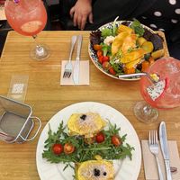 "Sodom and Gomorrah" bowl (13€) and Benedict of the Promised Land (15€) with two Pink Sangrias of Lust (6€ each). at Frutas Prohibidas in Madrid