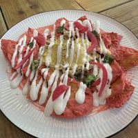 Pink Chilaquiles at Frutas Prohibidas in Madrid