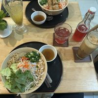 Noodle salad with tofu and mushrooms, hibiscus kombucha and coffee with condensed soy milk  at Nâunâu in Ho Chi Minh City