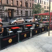 Outdoor seating at The Halal Guys in New York City