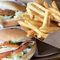 Chips, vegan chick’n burger and halloumi burger  at Vego's in Islington