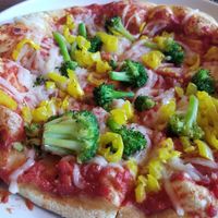 Vegan cheese pizza with banana peppers and broccoli at UNO Pizzeria in Hamilton