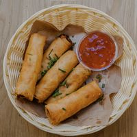 Vegan Springrolls filled with Sweetpotatoes, Cabbage and Ricenoodles at Papa Oro's in Baden