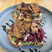 Brunch menu - tostada Leon 13 000 pesos   at Menta (Cafe de especialidad & Dulcería Vegana) in Puerto Natales