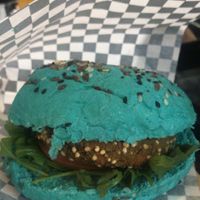 Quinoa burger with spirulina bread  at No Ponto in Nazare