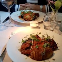 Portobello mushrooms and Lentil kebab dishes with potatoes  at Fellinis in Ambleside
