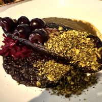 One of the main dishes, grilled aubergine with cherries, pistachio, black risotto and more.  at Glas Restaurant in Dublin