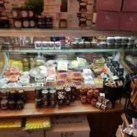 Fridge with vegan cheese choices at Pepper & Ginny - Vegane Veinkost in Vienna