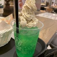 Melon soda float (ice cream covered with whip cream) at Futaba Fruits Parlor in Nagoya