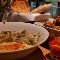 Aubergine 🍆 with hummus and falafel at Falafel Sababa in Berlin