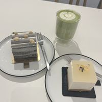 Black sesame cake with frosting, matcha latte and a yuzu cheesecake  at Soi & Co in Berlin