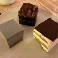 Black sesame cheesecake, chocolate cake, and tiramisu at Soi & Co in Berlin