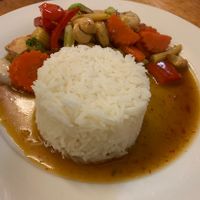 Cashew and tofu stir-fry with rice. Very good    at Madame K's Vegan- CBD in Melbourne