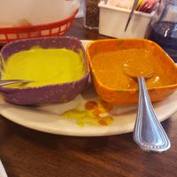 That orange salsa is hot and tasty !!! at Marla Restaurant in San Antonio