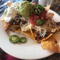 Nachos with Vegan cheese + sour cream at Red Lentil in Watertown