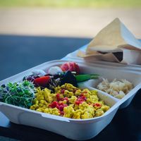 Tofu scramble plate with sauerkraut and sourdough bread.  at The Cardinal Herbs Teas and Spices in Honokaa