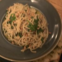 Vegan carbonara with parsley bread (sorry it’s blurry)  at The Black Bull in Cornhill-on-tweed