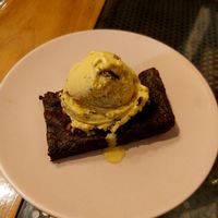 Brownie com sorvete de maracujá at Mona Café in Belo Horizonte