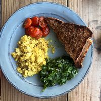 Surf, tofu scramble and homemade bread. Life doesn’t get better than this.   at Hang Ten Cafe in Muizenberg