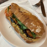 Sandwich with tomato, hummus and eggplant. at The Vegan Corner in Barcelona