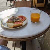 Zucchini Omelette with pan de tomate and fresh orange juice at The Vegan Corner in Barcelona