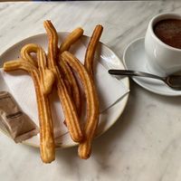 Churros and vegan xhoclatte  at The Vegan Corner in Barcelona