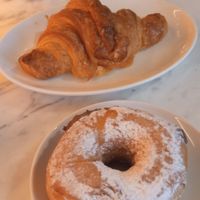 Chocolate donut and croissant at The Vegan Corner in Barcelona