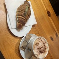 Pistachio croissant y cappuccino   at The Vegan Corner in Barcelona