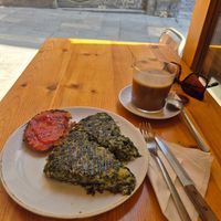 Spinach frittata and flat white at The Vegan Corner in Barcelona