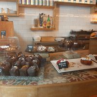 Assortment of baked goods, sandwiches with omelettes or frittatas and some pasta options with vegetables at The Vegan Corner in Barcelona