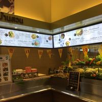 Shop front with the little เจ flags at Vegan Garden House in Chiang Mai