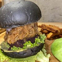 Black bean patty with caramelized onions  at Roots in Hanoi