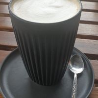 Bonsoy latte in huskee cup✅ at The Yoga Place Cafe in Blacksmiths