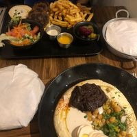 hummus plate and vegan kebab dish at Nish Nush in Cologne