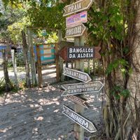 Signs indicating to the restaurant. There are a few around the village.  at Canto da Duca Restaurante in Caraiva