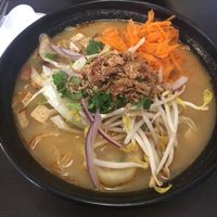 Veg dumpling laksa noodle soup w added tofu  at Dumpling World in Hobart
