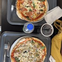 Vegan pizza special and one made with our choice of toppings.  at Pizzeria Bros in Montreal