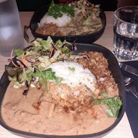 Tofu/rice/nuts'sauce/fried onions/cilantro and salad.
Delicious!!!
 at Djawa - Republique in Paris