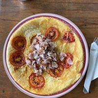 Tomato and caramelized onion pancake   at Pancake 4 Paws in Ratnanagar
