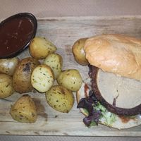 Veggie burger with a slice of cashew cheese 😋 at Pasapan in Segovia