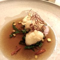 Steamed spiced  silken tofu, puffed rice, chilli, fragrant oils, sesame

 at Ezard in Melbourne