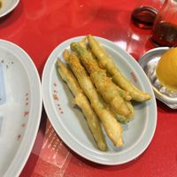 Tempura green beans sprinkled with curry powder   at Izakaya Masaka in Tokyo