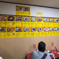 Menu displayed on the wall inside  at Izakaya Masaka in Tokyo