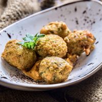 Spinach, apple and coconut fritters with romescu sauce  at Blat al Sac in Mallorca