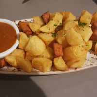 Bravas BLAT(mix of fried sweet potatoes and potatoes with spicy sauce) at Blat al Sac in Mallorca