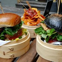 BBQ Burger, Kiiro Black Burger and fried sweet potatoes at Kiiro Burger in Berlin