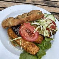 Focaccia burger with tofu rosso, grilled vegetables and pesto   at Bio-Cafe Kieselstein in Potsdam