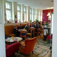 Cosy indoor seating area at Bio-Cafe Kieselstein in Potsdam